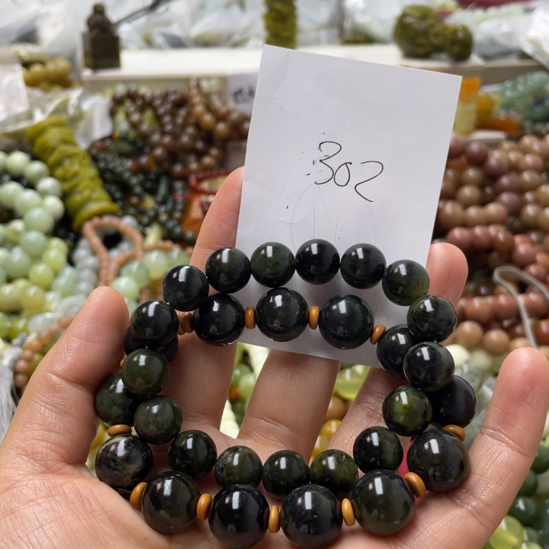 蛇纹石玉手链合金九**你