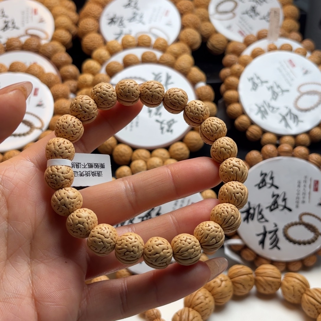 C***r菩提籽类东北野生小金丹桃核手串