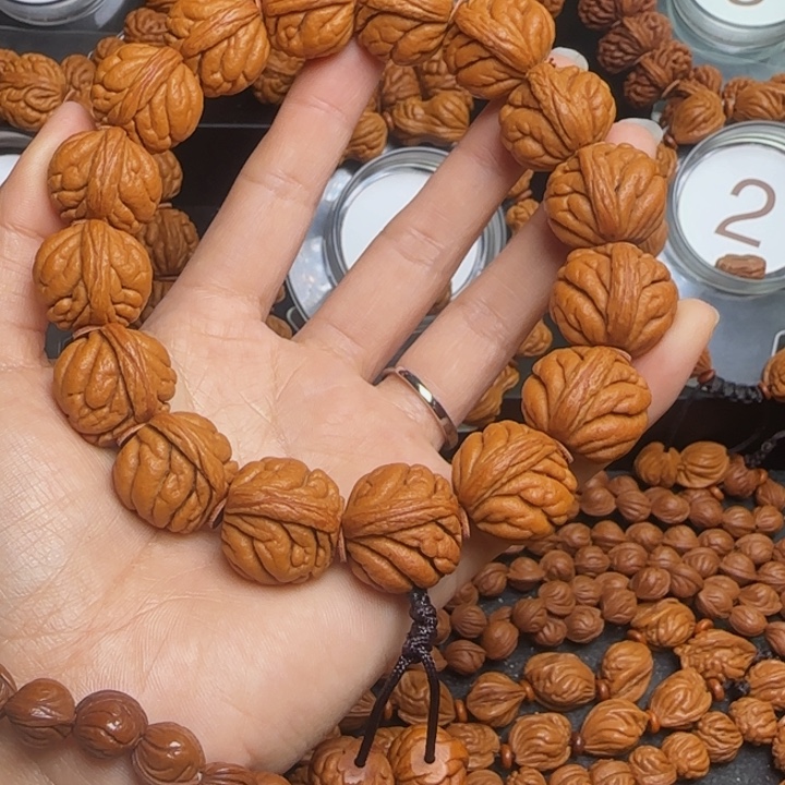 用***5手串桃核龙纹桃核