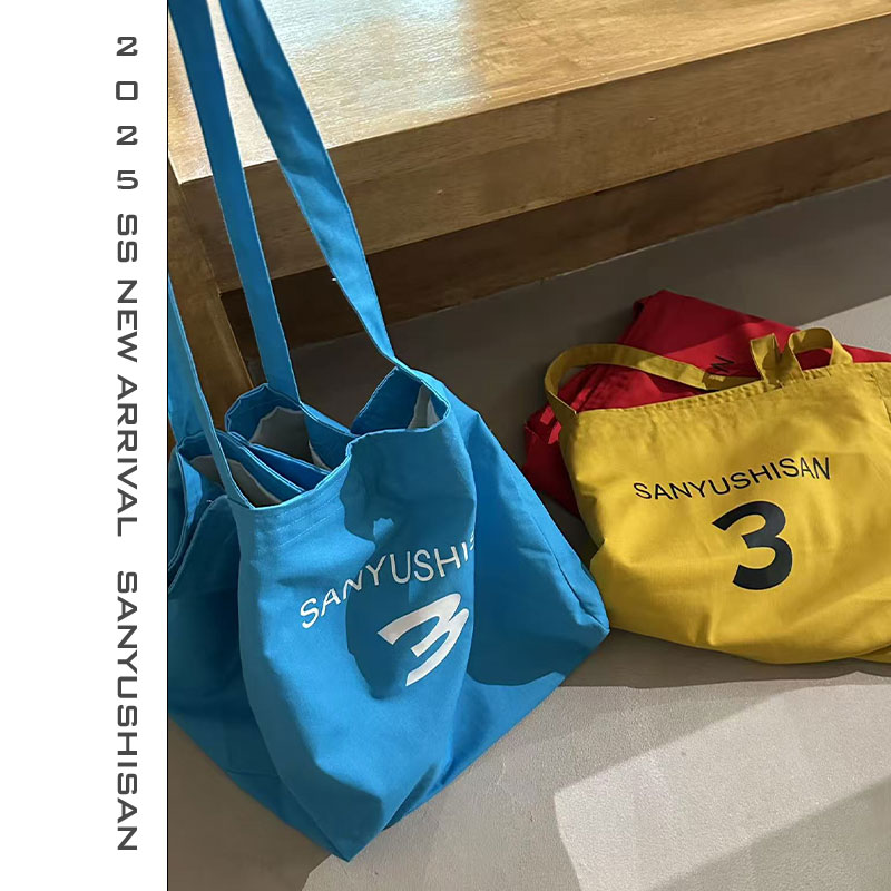 三与十三|包满意|韩版新款帆布包大容量单肩字母简约休闲