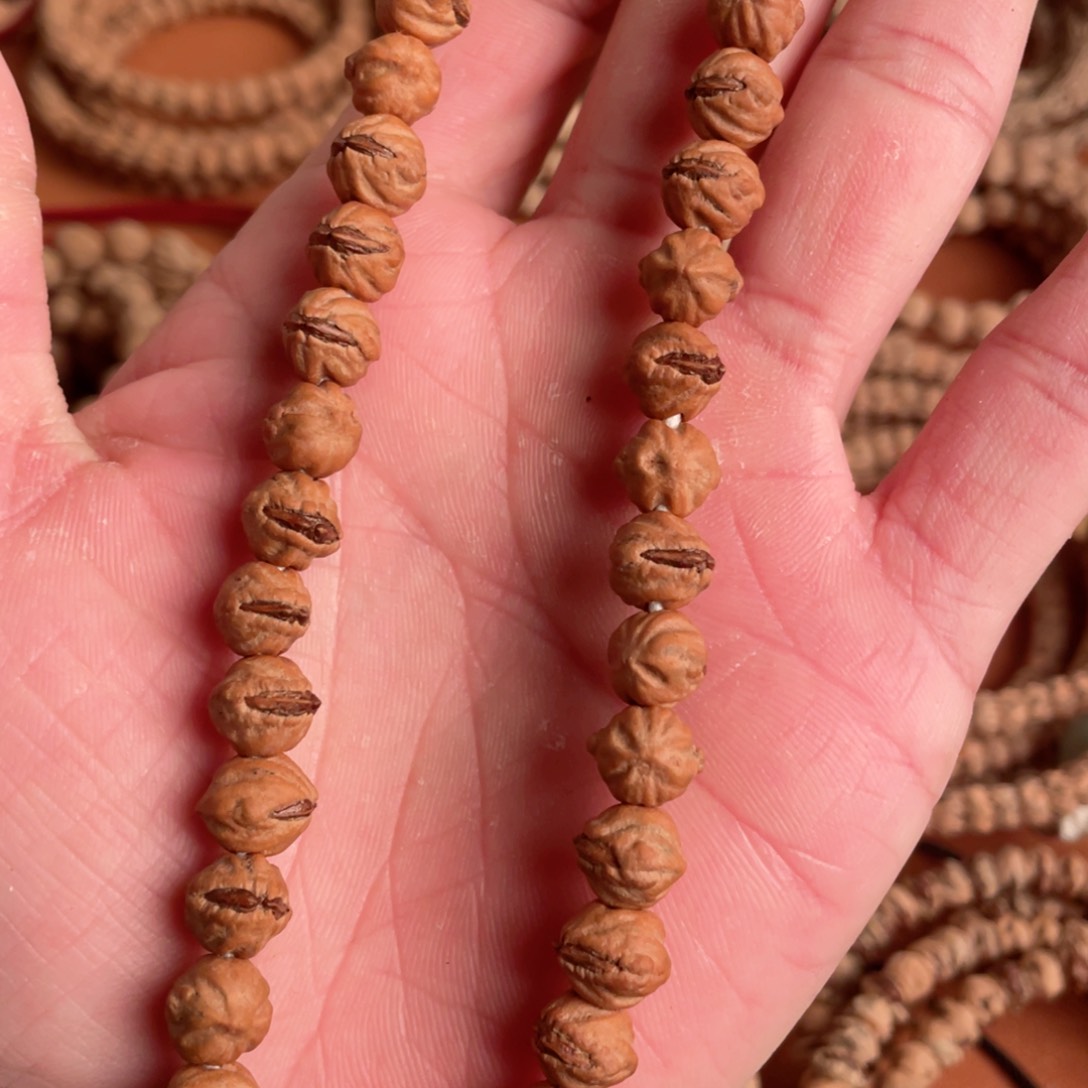 愤**?热振柏香籽红皮横打手持