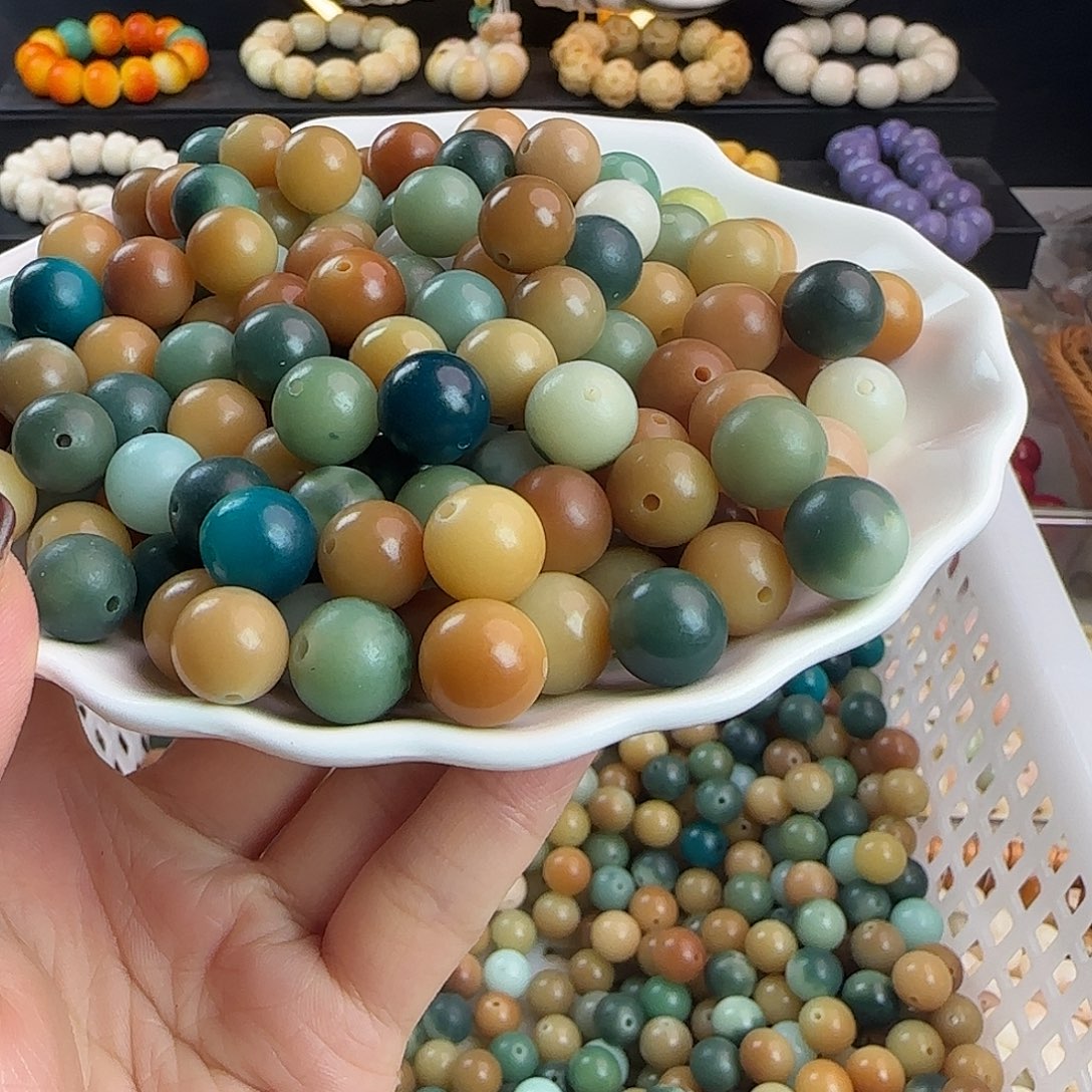 菩提根/象牙果手串卡12孔雀蓝多宝圆1000颗