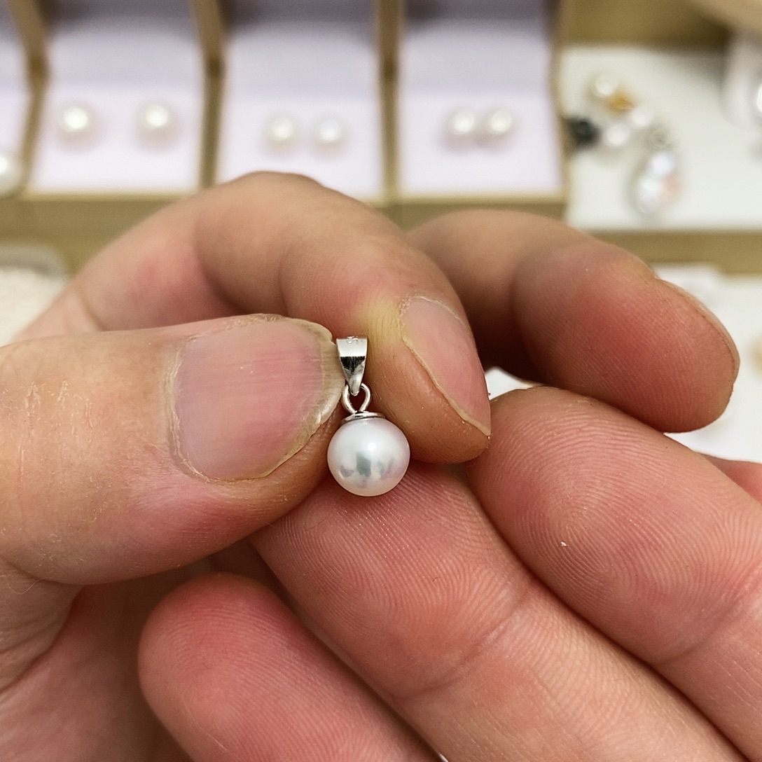 淡水珍珠6.8m极光瓜子扣吊坠银S925镶嵌