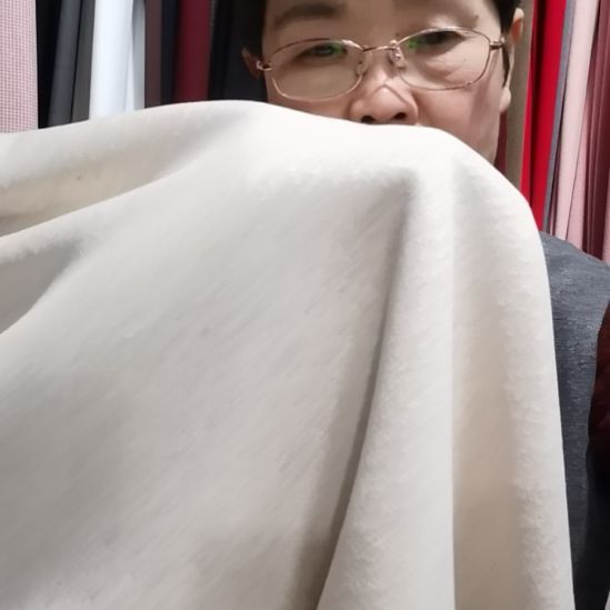水洗羊绒布料斜纹米白