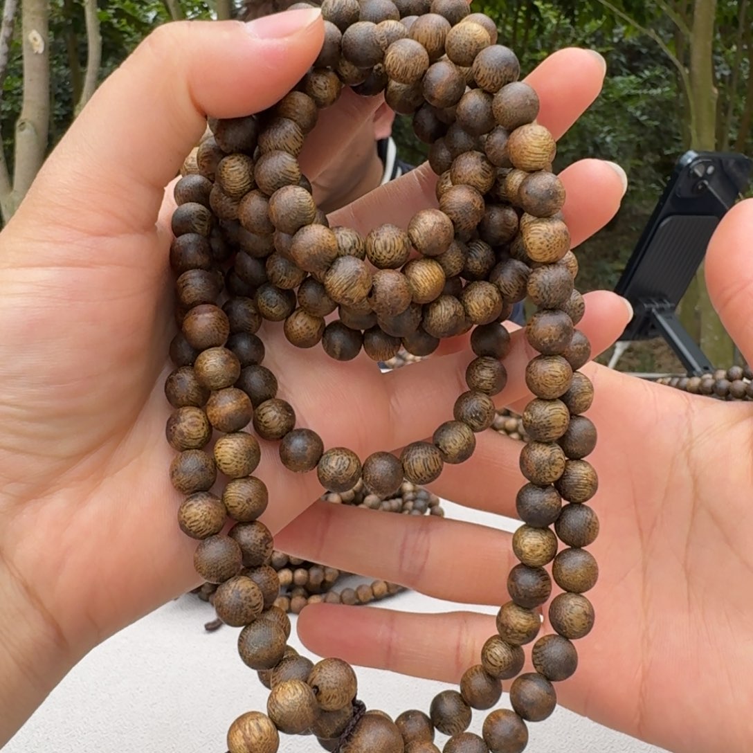 沉香手串乌身圆叶圆珠多圈0.8，24多样性发一