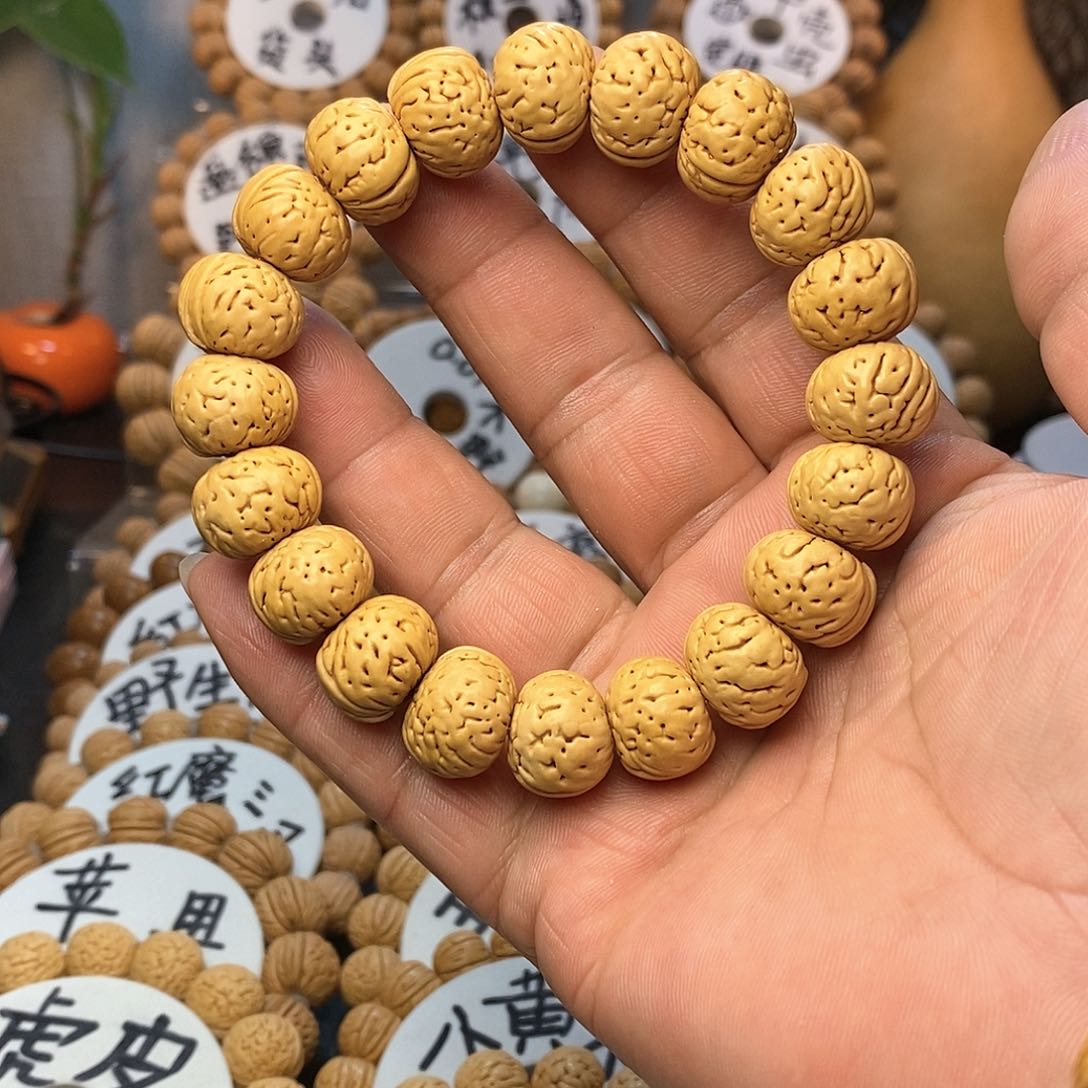 【闪购商品】﹏****、桃核手串纽扣手串