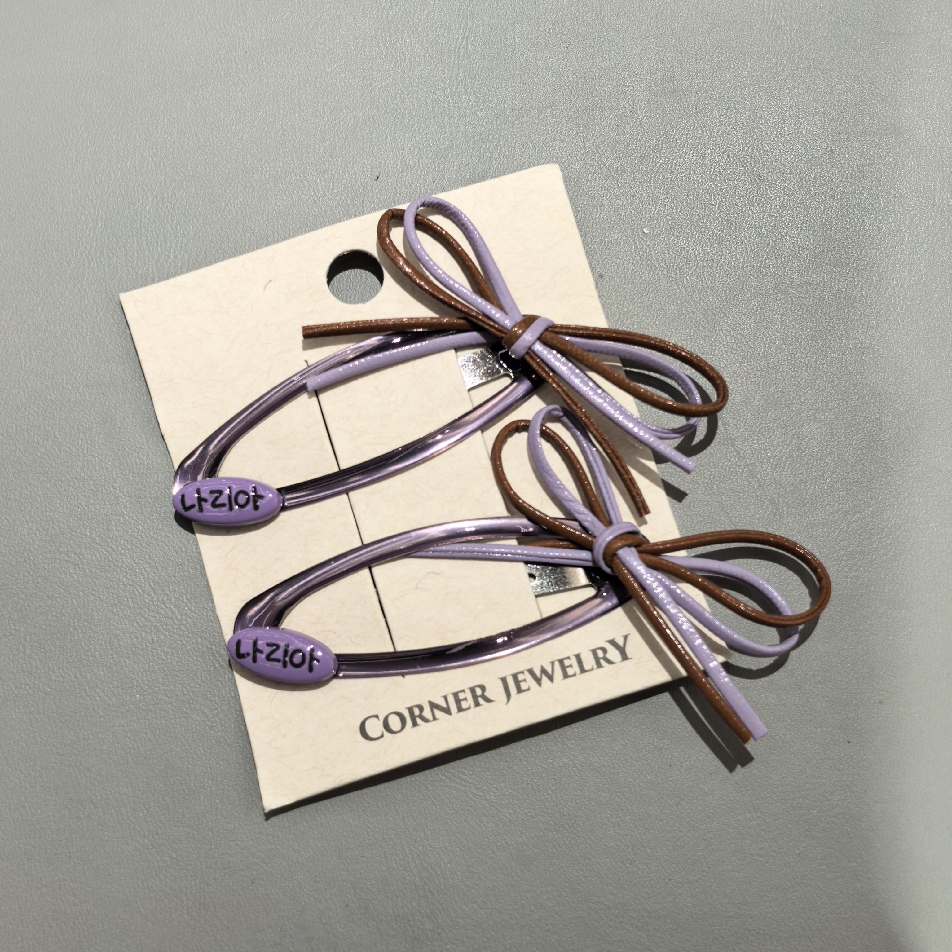 A075紫色皮皮蝴蝶结掰掰夹一对