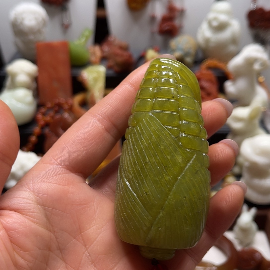 蛇纹石玉手把件未镶嵌