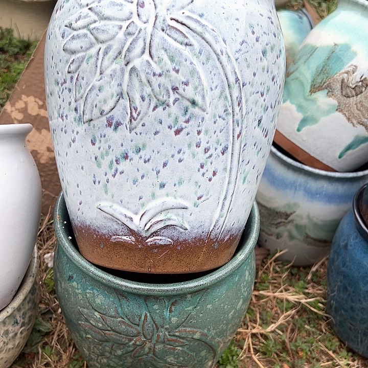 红陶口20高25。。。。