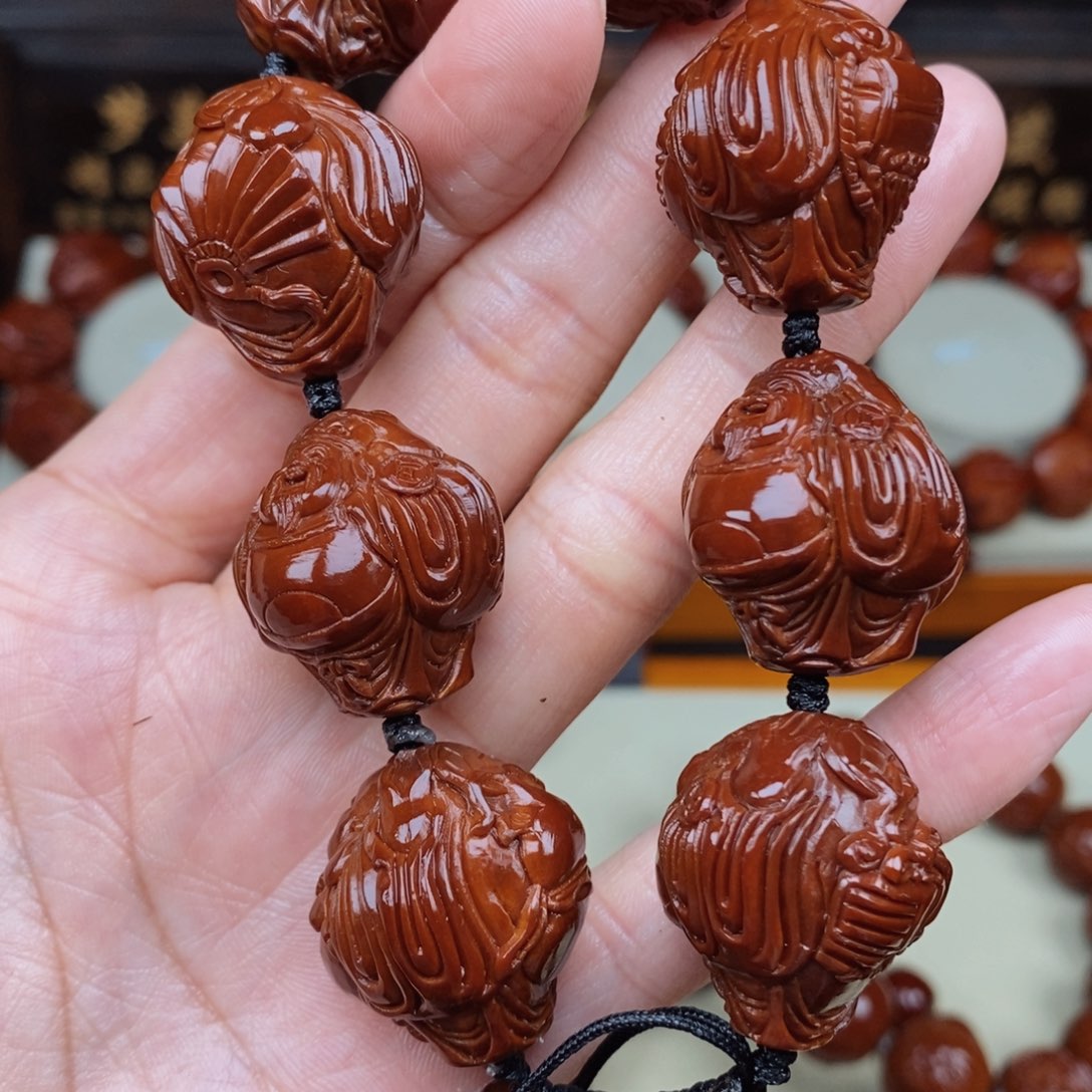 橄榄核手串小****宫财迷，