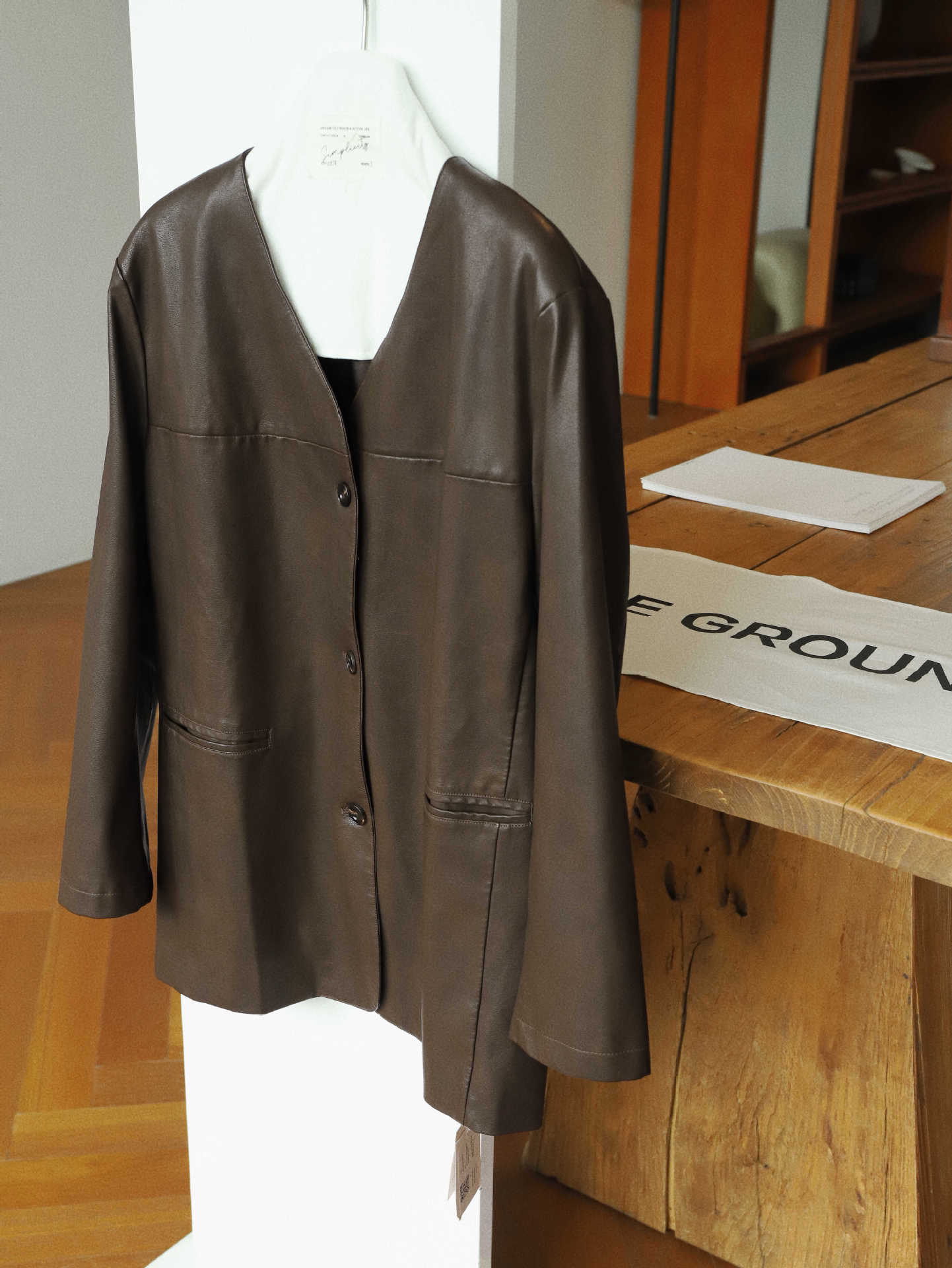 不挑人 挺括有型仿真皮皮衣 设计感V领宽松中长款外套