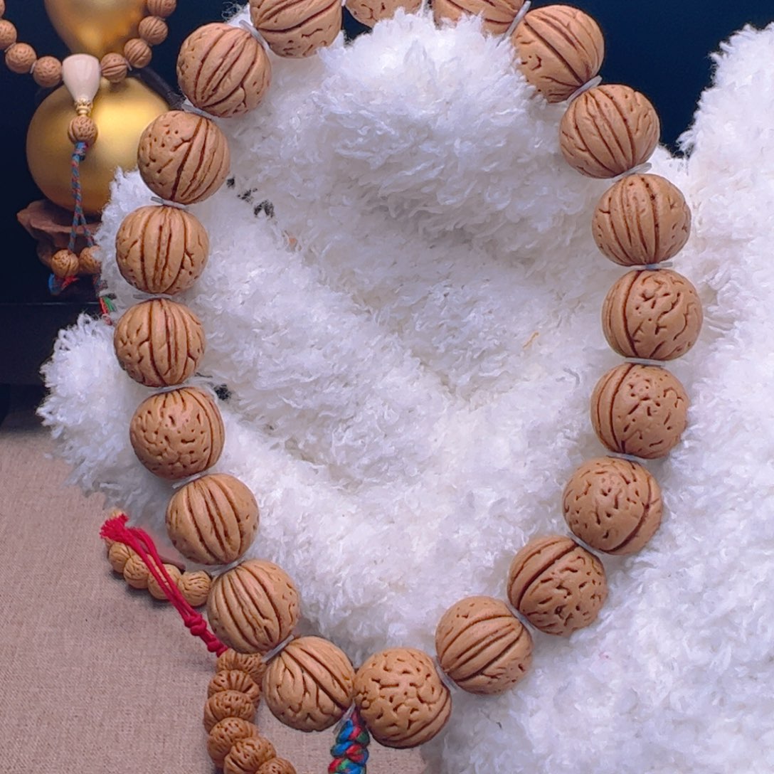 桃核手串1.4肥脐三道金手持