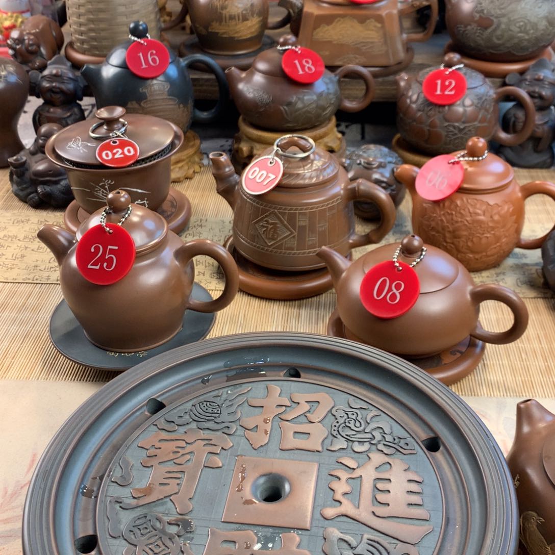 浪**?电刀手拉胚原矿坭兴陶