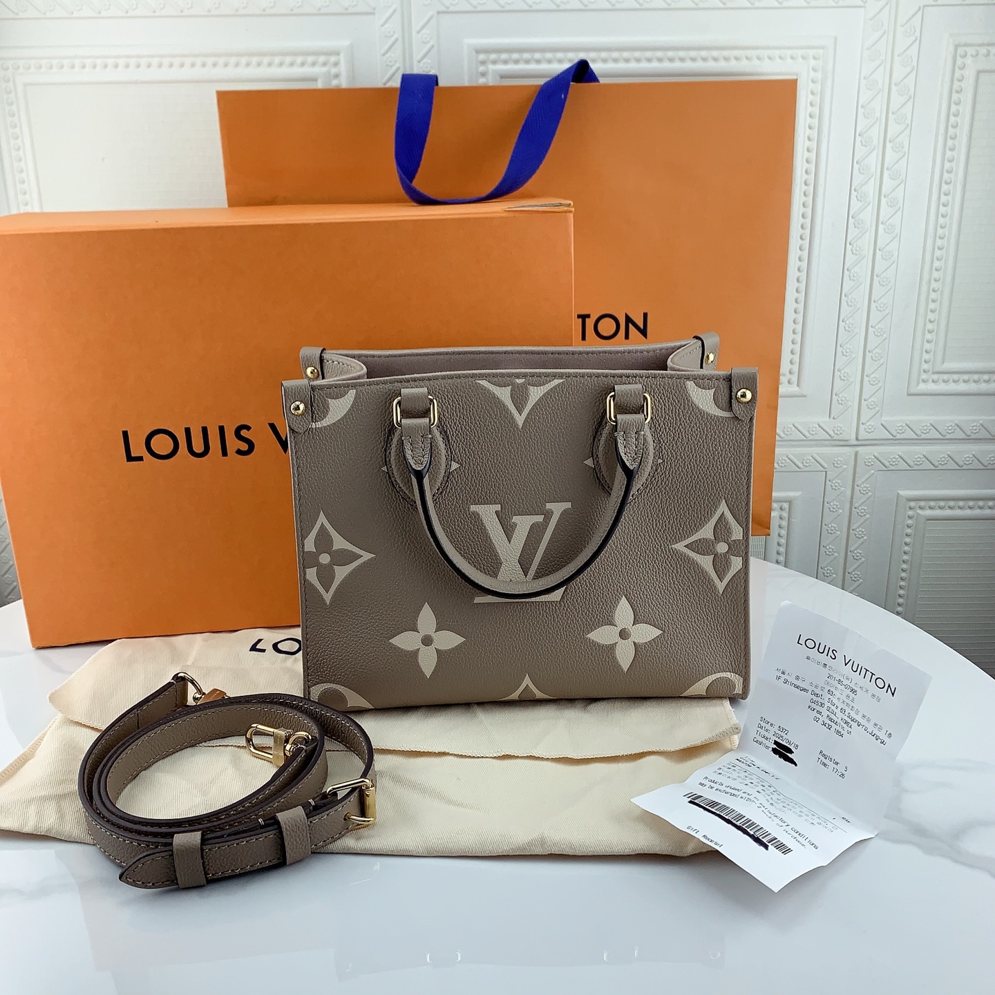 99新 LouisVuitton/路易威登 大象灰onthego小号压纹粒面牛皮纯皮