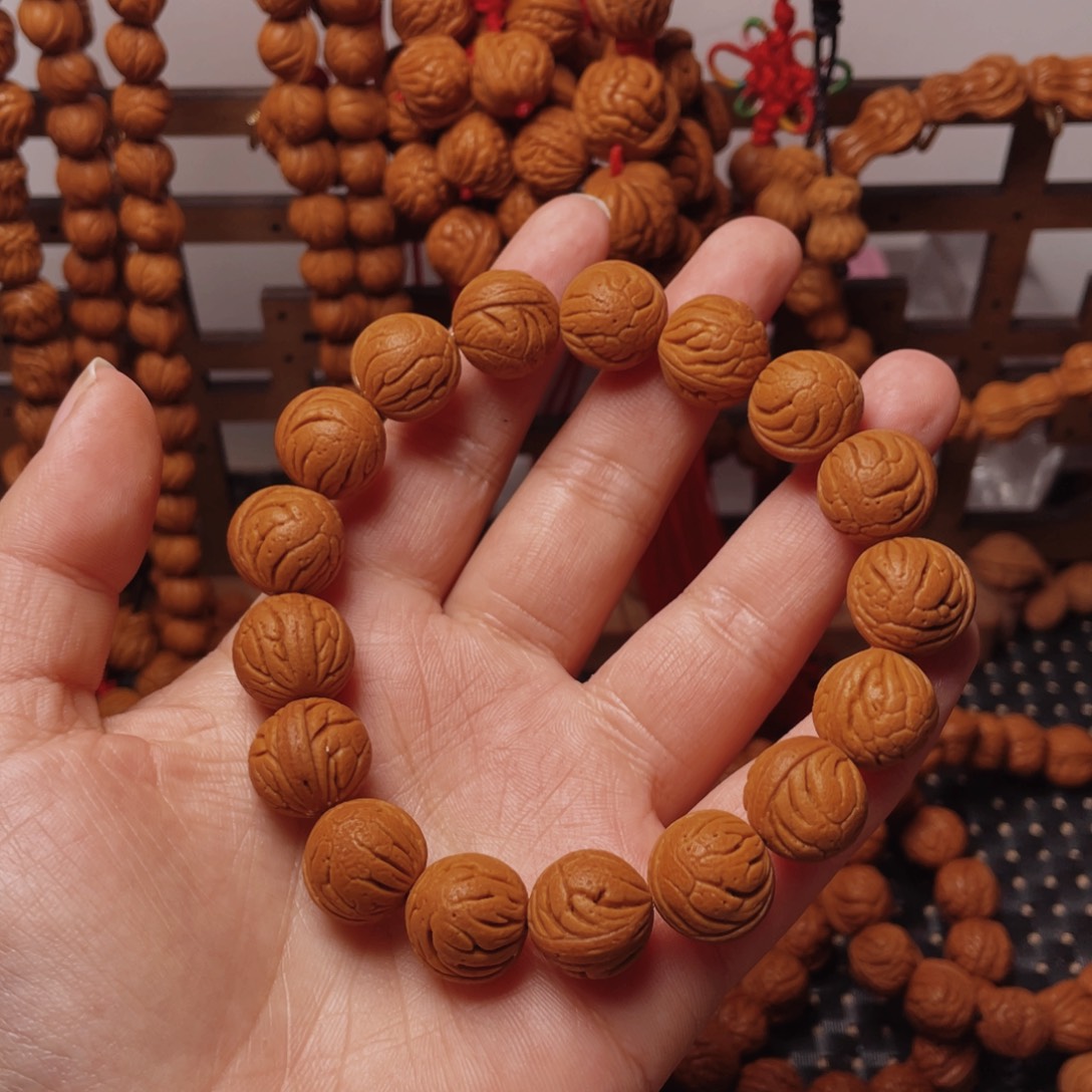 木质类龙纹桃枭手串
