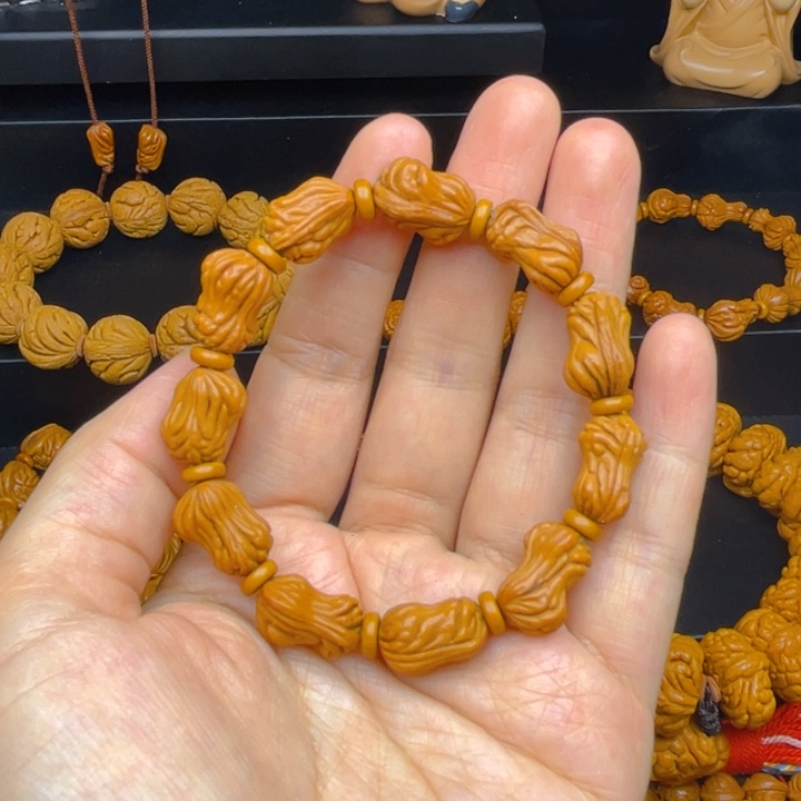 桃核吊坠花生手串