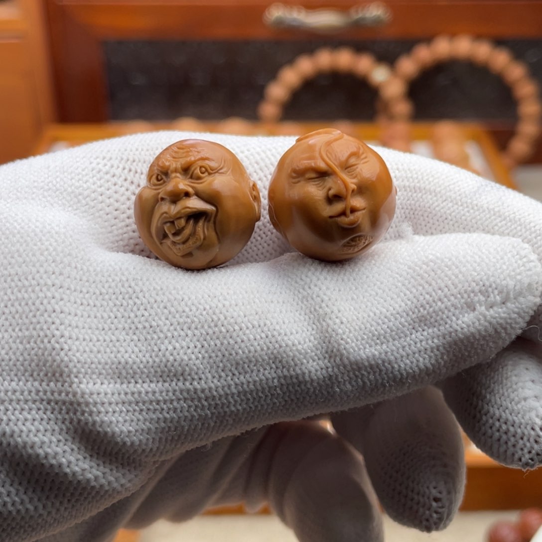 文玩核桃吊坠知*猴头核桃雕刻