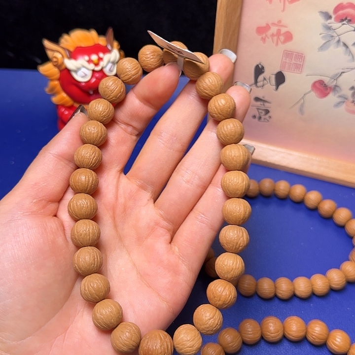 忙***仔手串猴头核桃凤羽