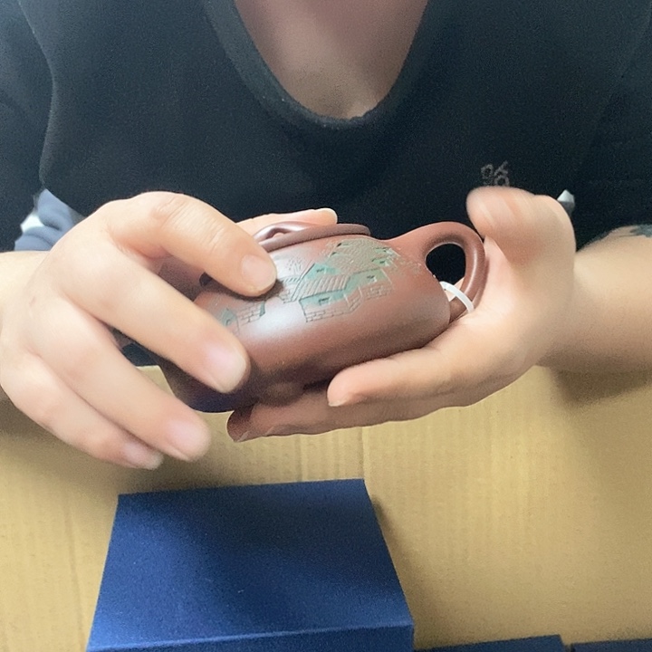 紫砂茶壶仍然让他柔软