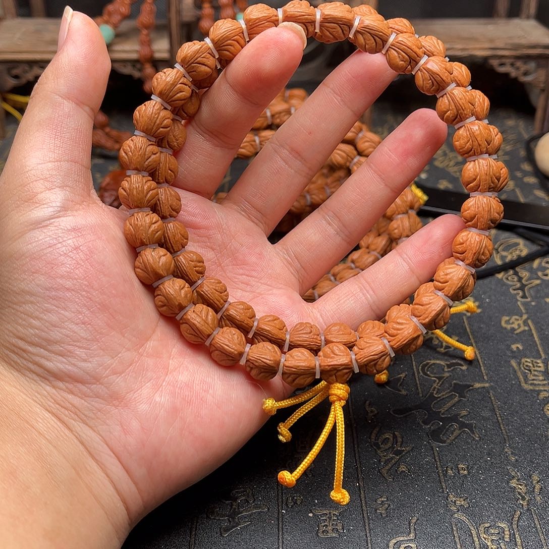 桃核吊坠玉龙手持