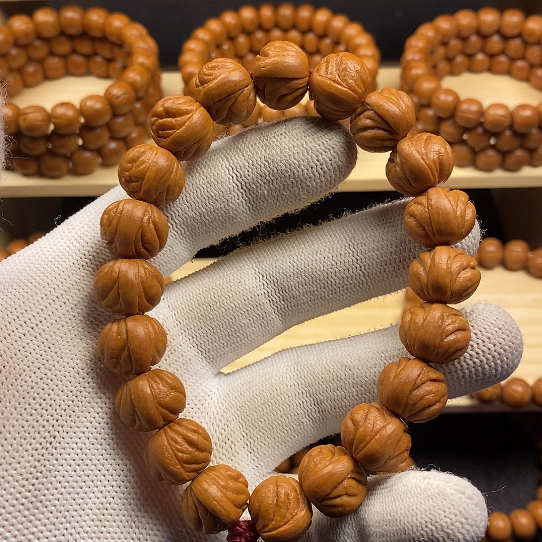 桃核手串龙纹原皮