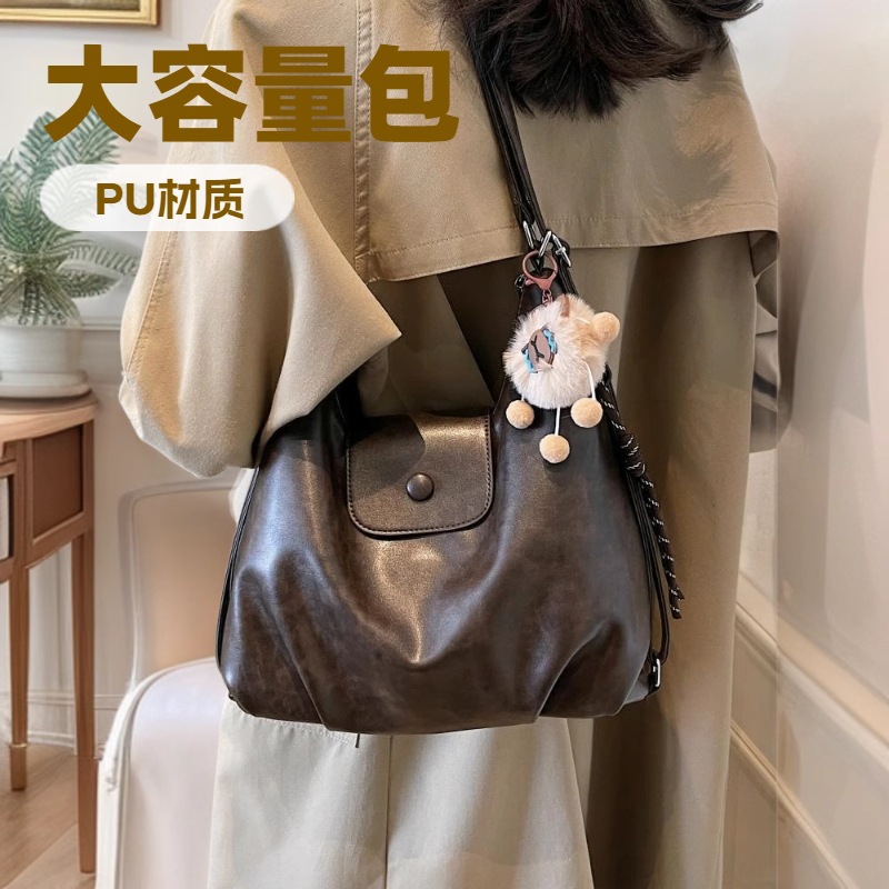 时尚女包单肩托特包女2025新款女士包双肩包设计感轻便旅游背包女