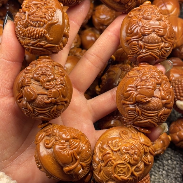 橄榄核吊坠贏**来橄榄核