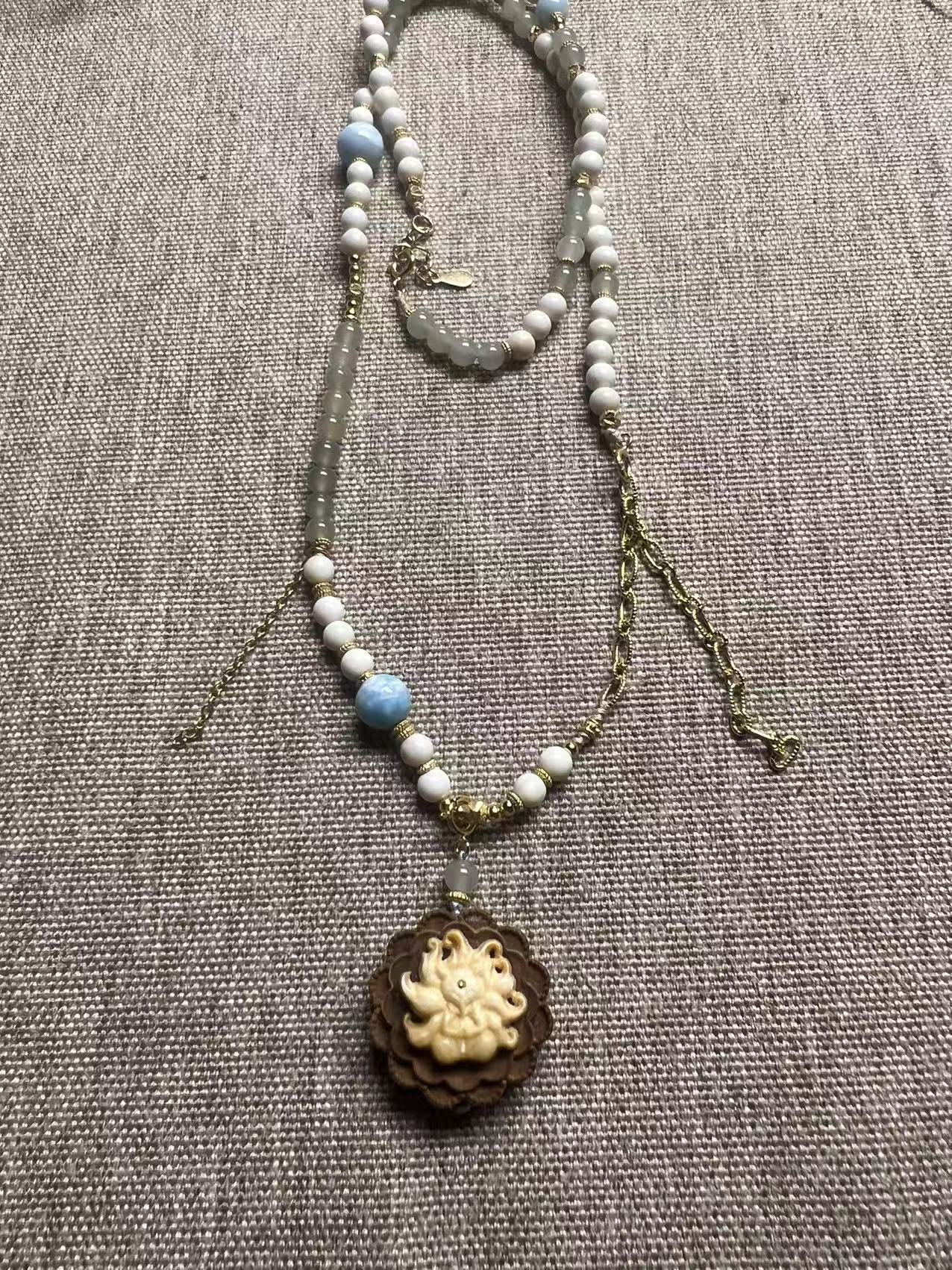 猛犸牙吊坠凤九毕业