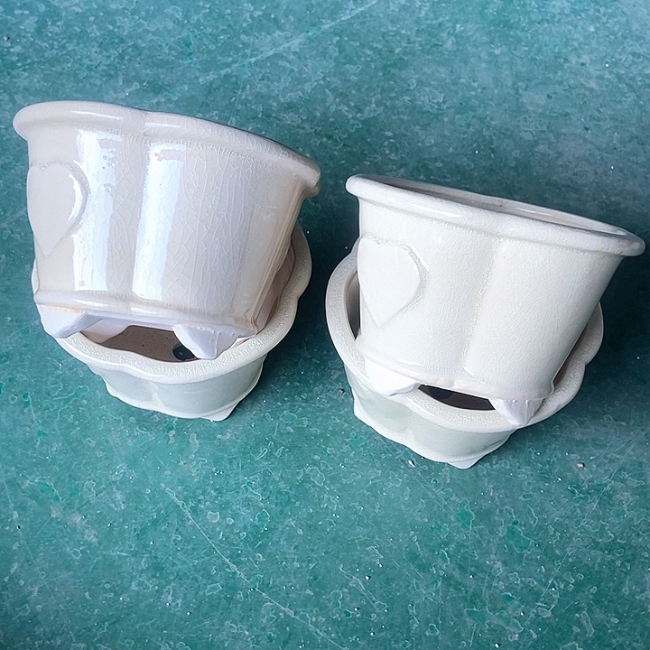 红陶口16。高11。。。。