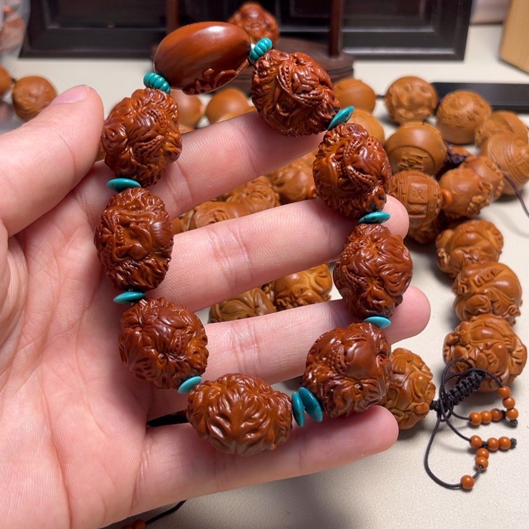 橄榄核吊坠瑞****厅老虎头