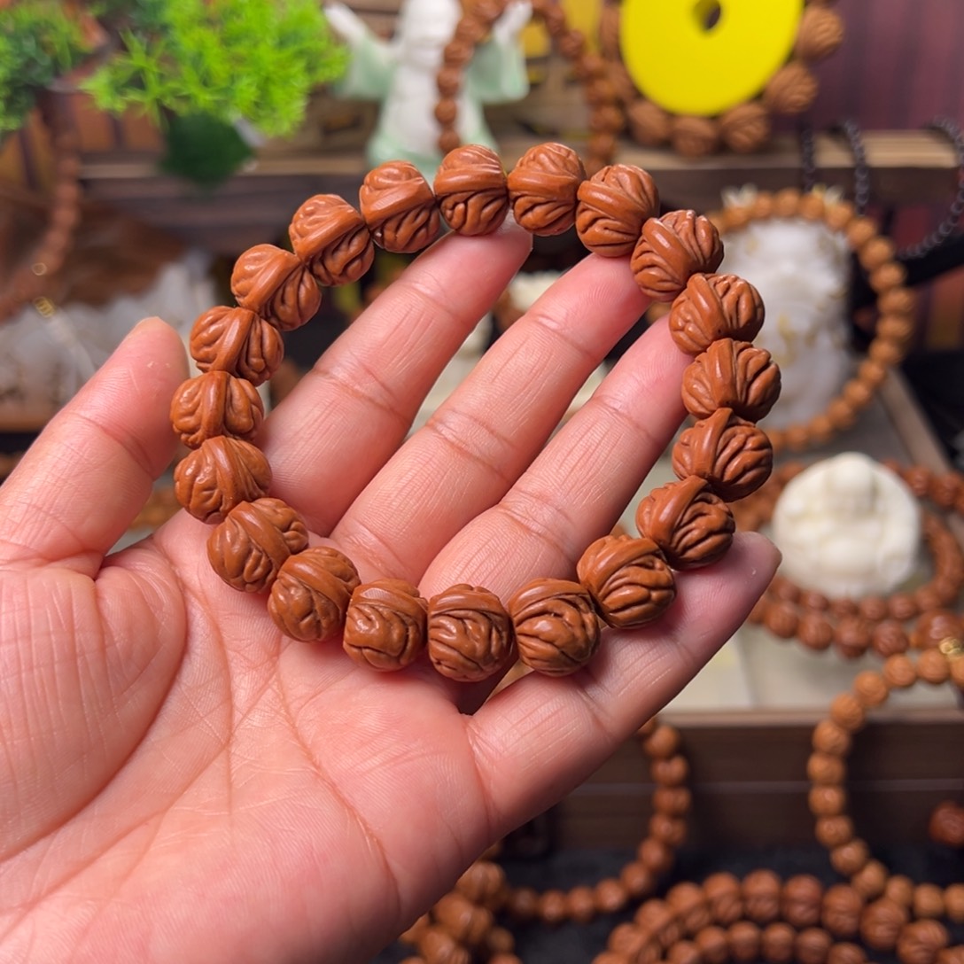 沐***辰桃核吊坠双脊龙手串15