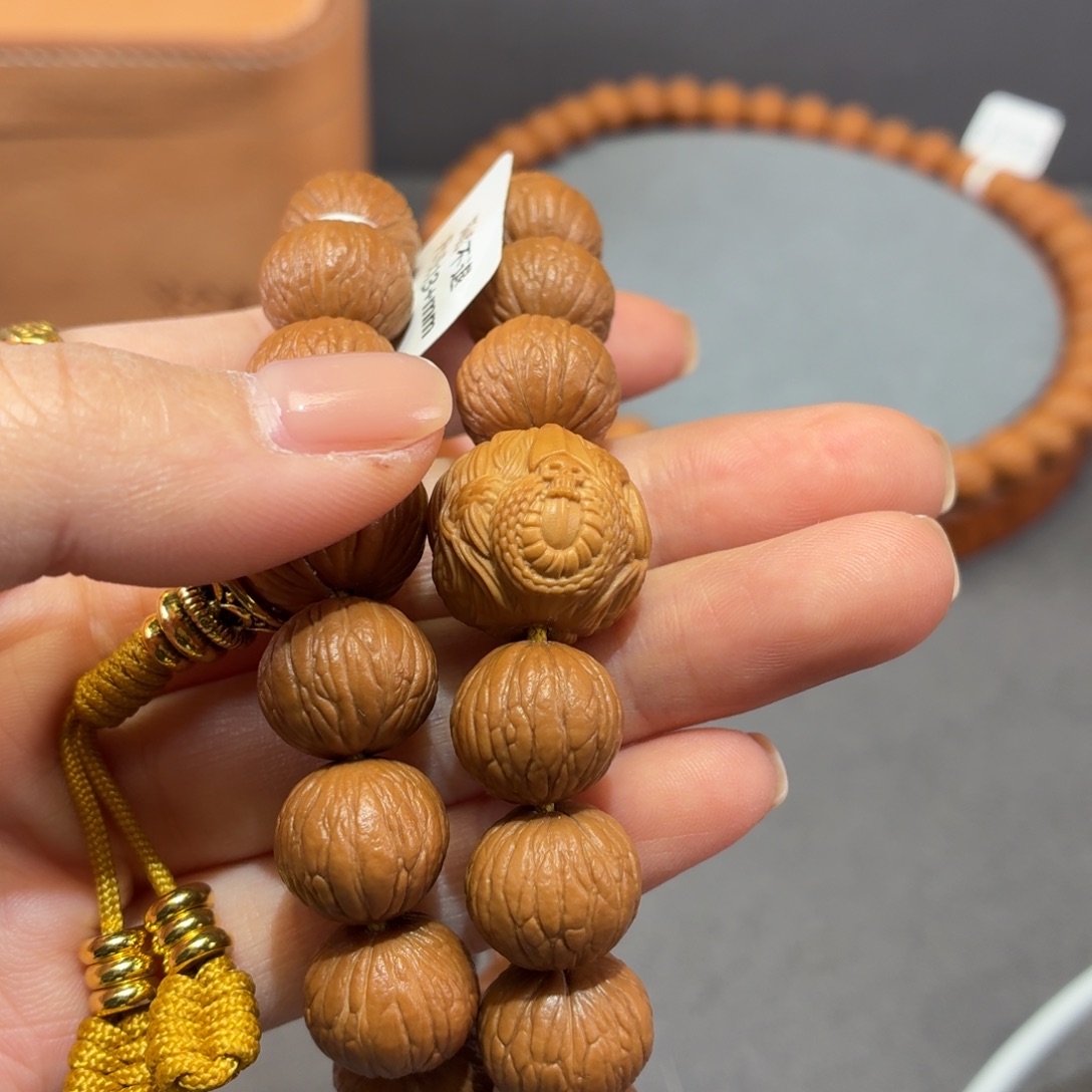 无***悔吊坠桃核13双圈凤羽