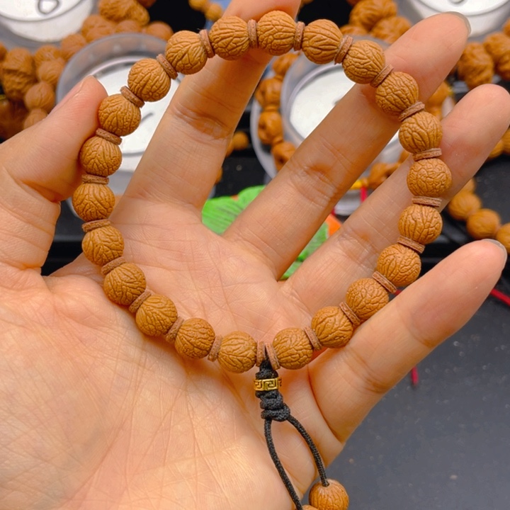 王***安桃核吊坠见见见见见见2