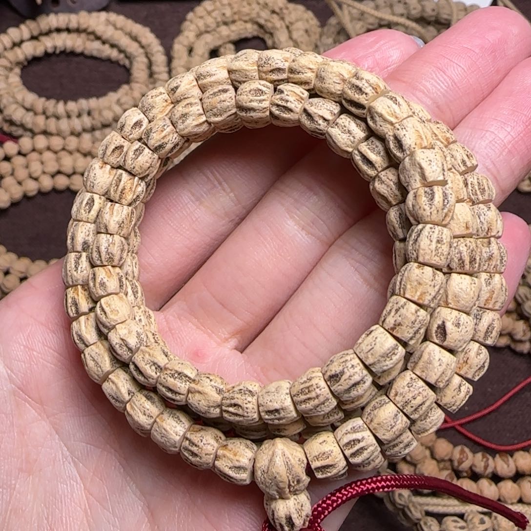 柏香籽/百香籽吊坠那****忆