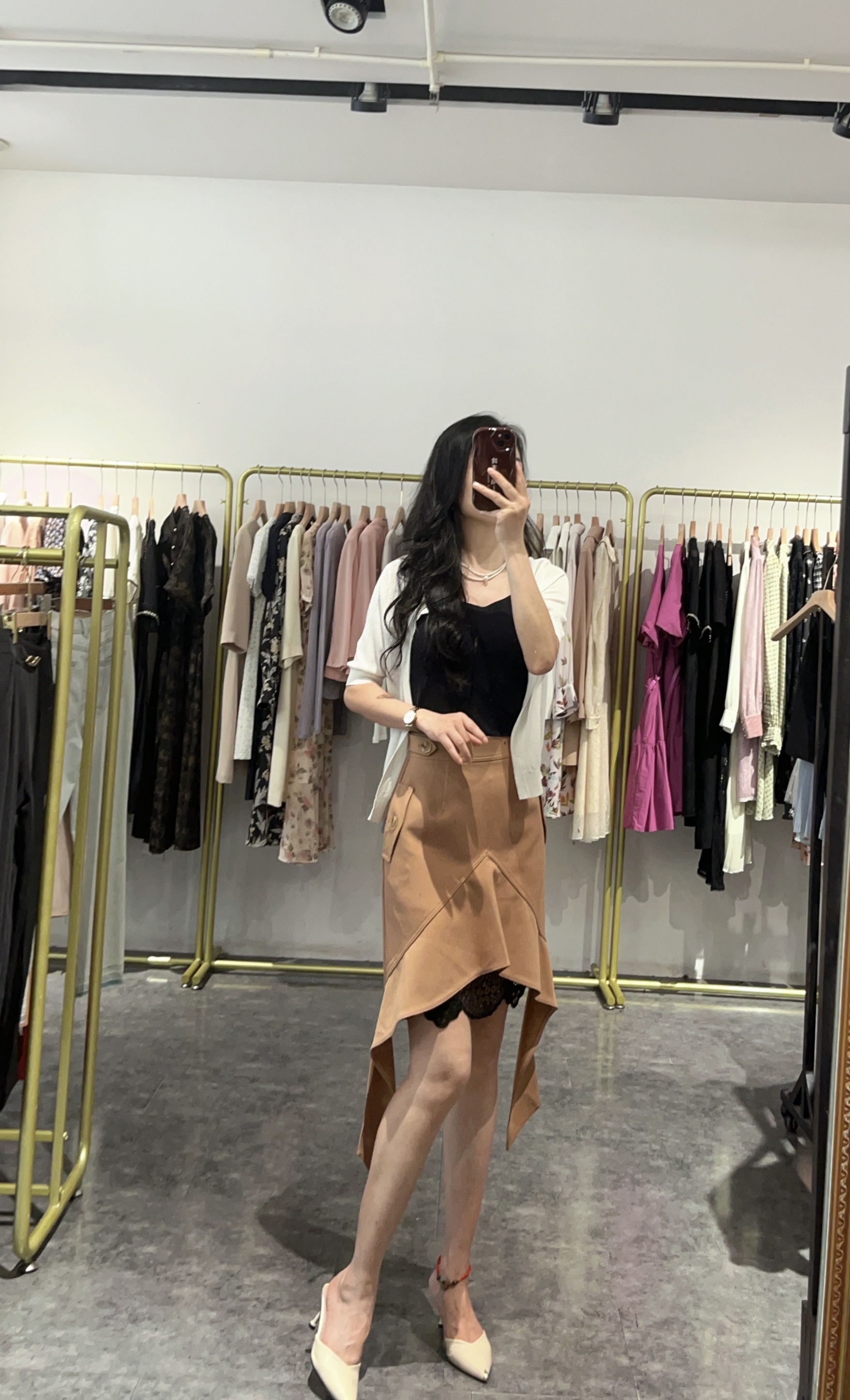 季候风女装秋冬季不规则斜裁高级感优雅女士中长款A字半身裙