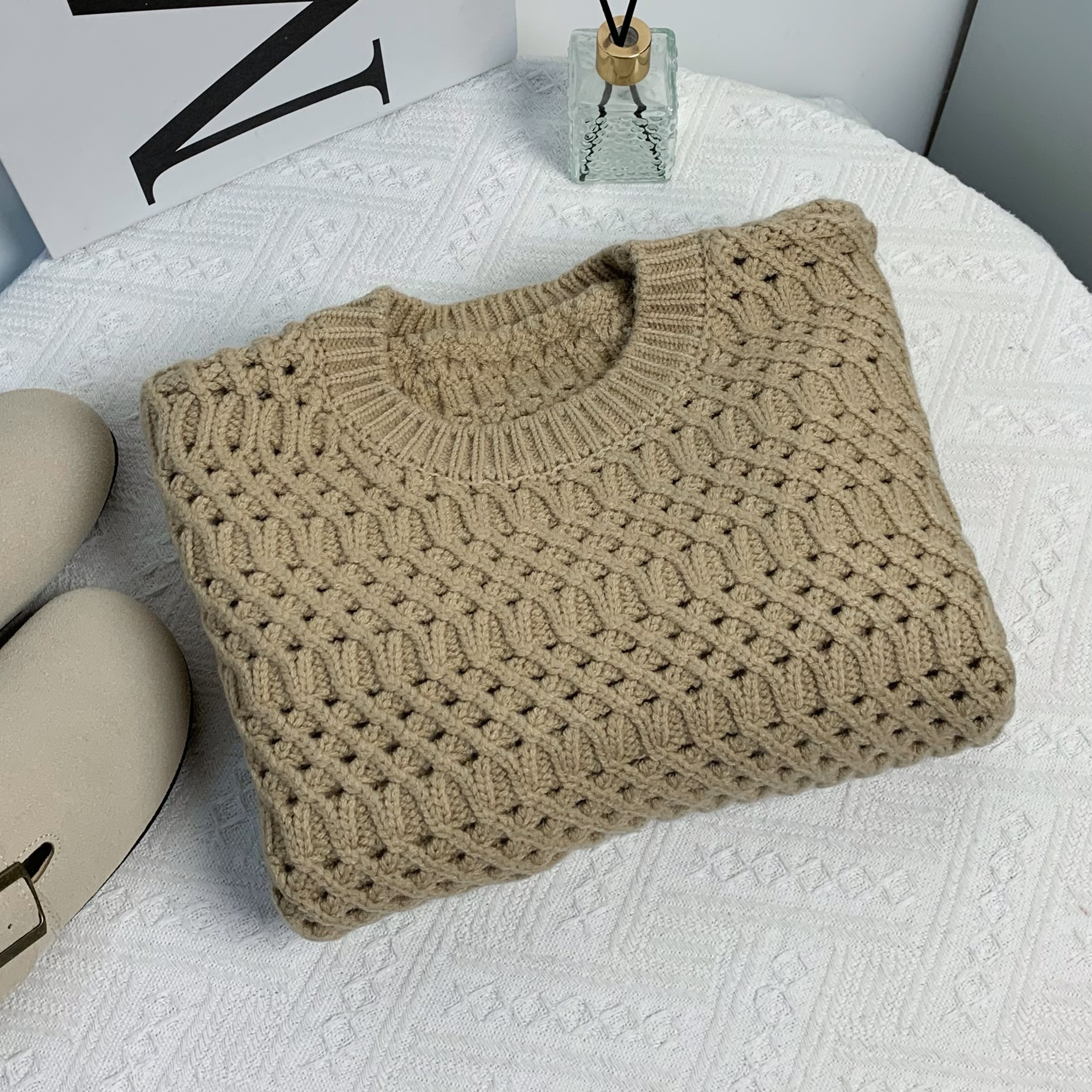 清-汤圆吖杏色短款圆领套头镂空款针织毛衣253356