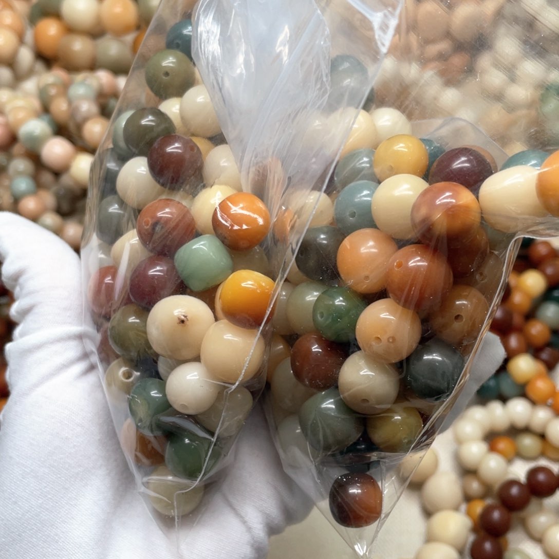 菩提根/象牙果吊坠瑕疵水磨混珠100颗8888