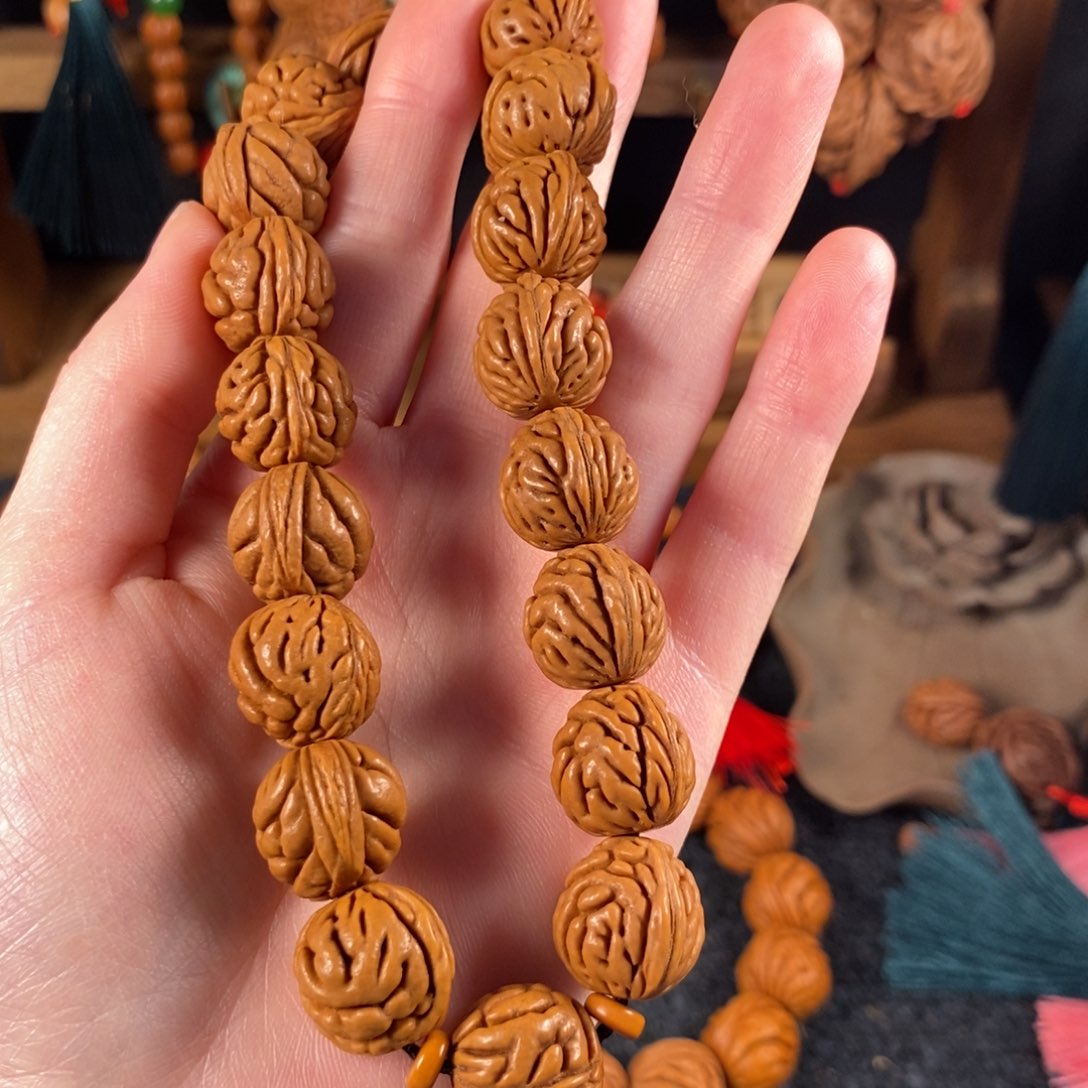 吊坠桃核蓝*亮桃枭手持