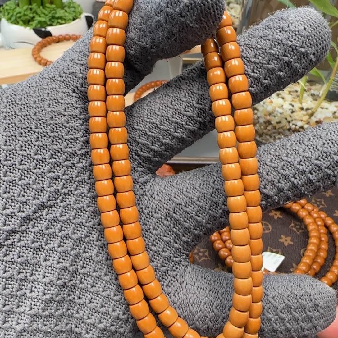 橄榄核吊坠老挝6.2mm直切三花面无白108