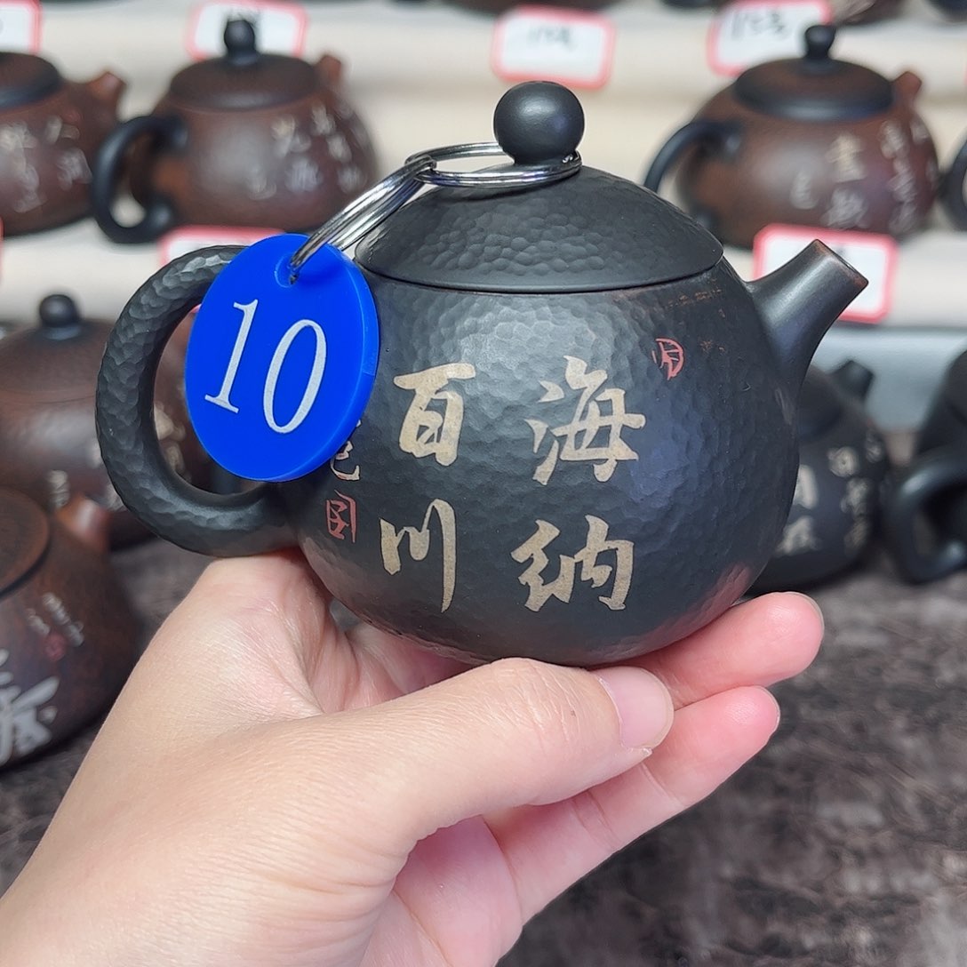 170毫升微微瑕纯手工锤纹刻填龙蛋壶