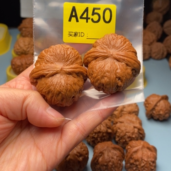 屋***哥文玩核桃吊坠元宝精对 44