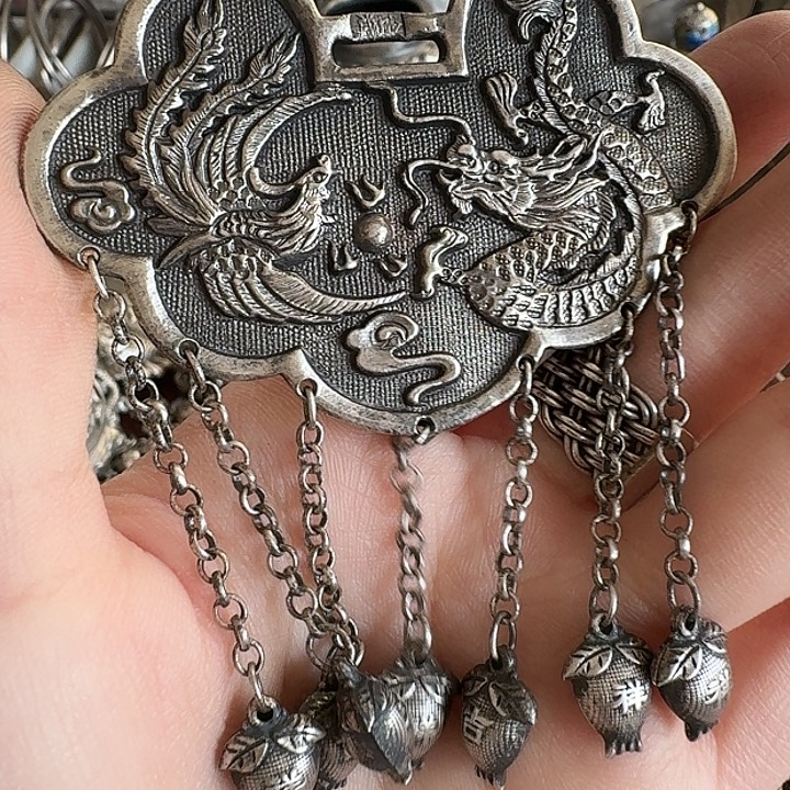 韩***敏非金属足银锁片一个