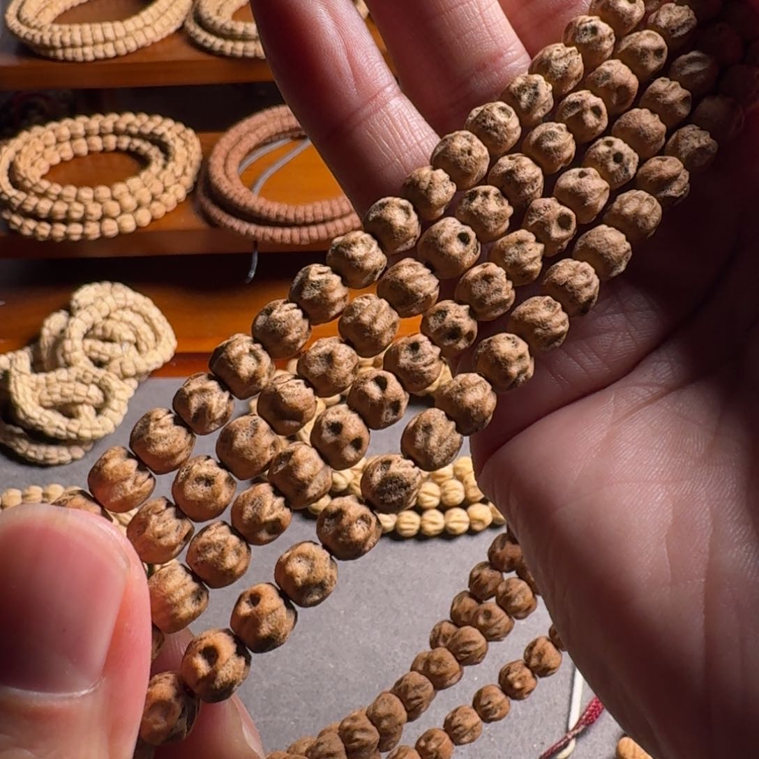 柏香籽/百香籽手串7毫米红皮热振鬼脸