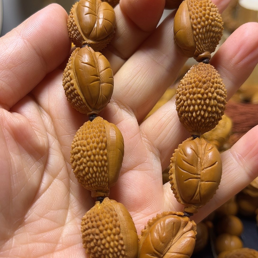 橄榄核吊坠qerttyuui