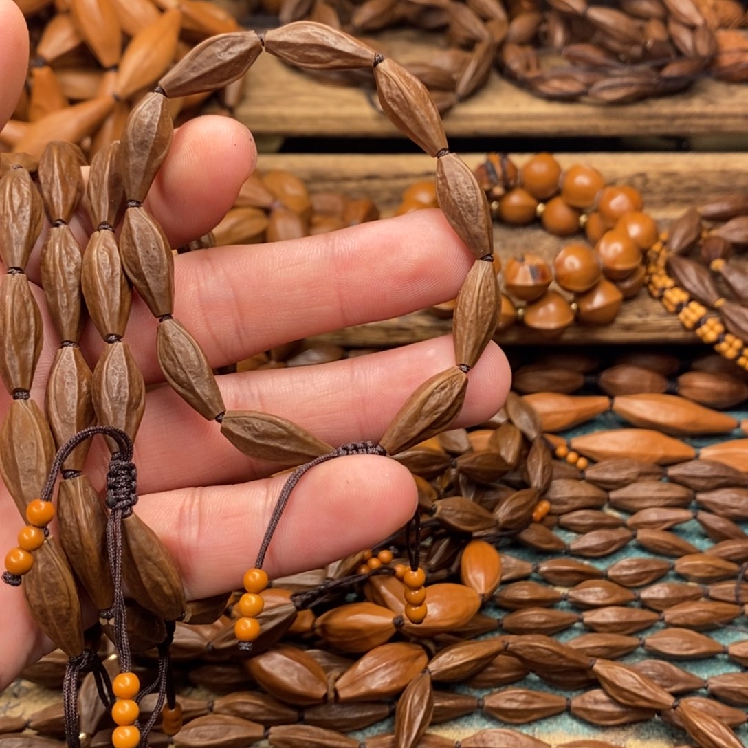 橄榄核手串/手链王*木0.8。 12颗