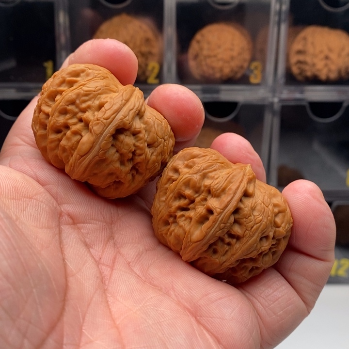 桃核吊坠H*i文玩核桃658568889