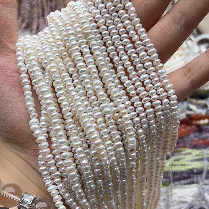 未镶嵌玛瑙/玉髓珠宝半成品一条4-6mm左右不规则算盘珍珠