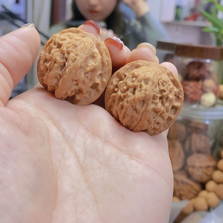 【闪购商品】文玩核桃把件35凤眼