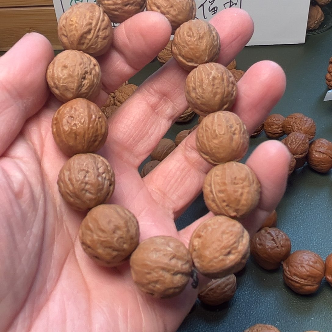 桃核吊坠花*.精品秋子手串核桃