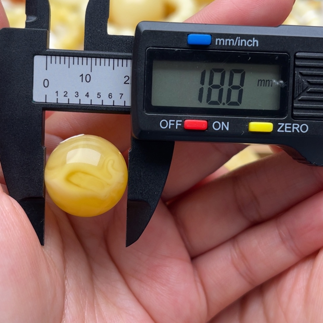 琥珀未镶嵌裸石蜜蜡圆珠笑